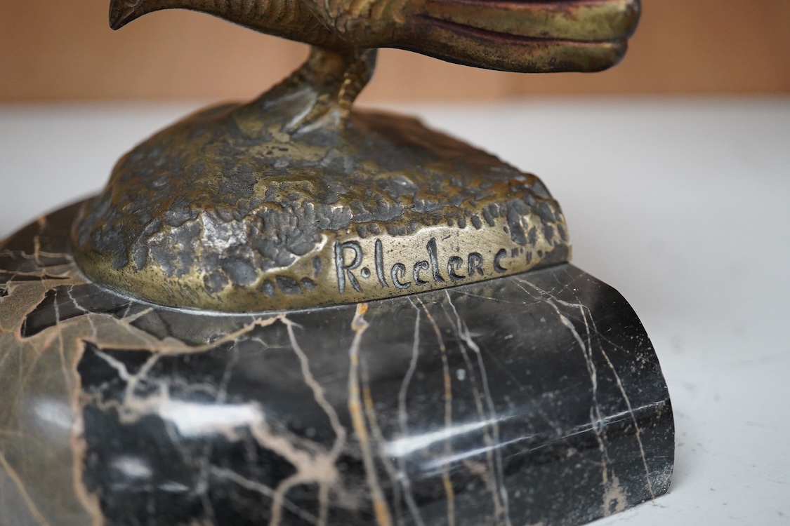 A pair of bronze peacock bookends, with remains of coloured pigments, marble plinths, signed R. Leclerc, 20cm